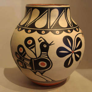 Bird, floral and geometric design on a polychrome jar