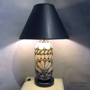 A cotton flower and geometric design on a polychrome lamp