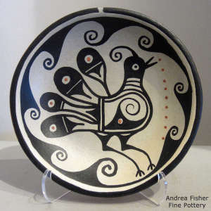 Bird and geometric design on a polychrome plate