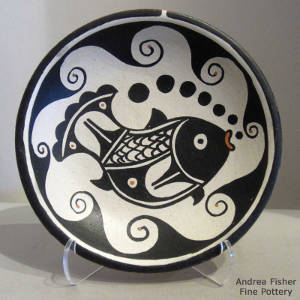 Fish and water design on a polychrome plate
