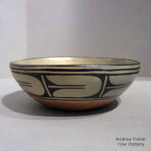 Polychrome dough bowl with fire clouds and a geometric design
