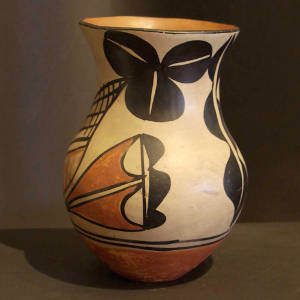 Cloud, water and geometric designs on a polychrome vase