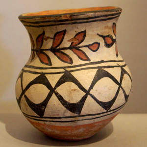 Floral and geometric design on a polychrome jar