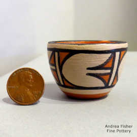Geometric design on a miniature polychrome bowl