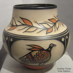 Bird, floral and geometric design on a polychrome jar