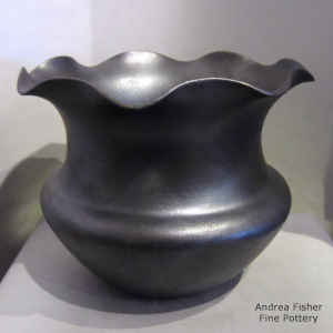 Black micaceous grandmother jar