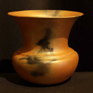 Flared opening and fire clouds on a golden micaceous jar