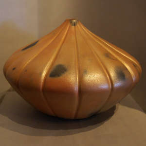 Melon jar in golden micaceous clay