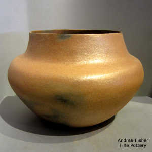 Fire clouds on a golden micaceous jar