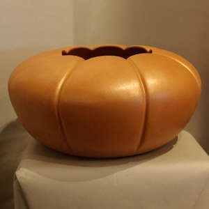 Melon jar in golden micaceous clay