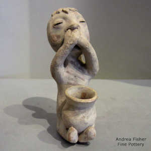 Polychrome Rain God holding a pot