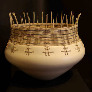 Basket weaving around the rim of a large white bowl