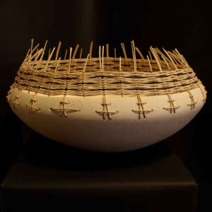 Basket weave around the rim of a large micaceous white bowl