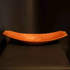 Metal studs on a red tray