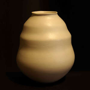 White micaceous slip on an organic jar