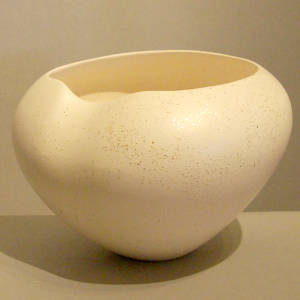 Organic shape in white micaceous clay