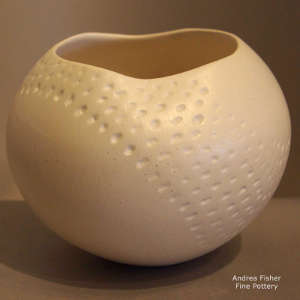 Band of corrugation on a white micaceous organic shape