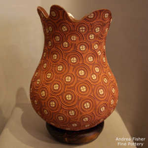 Textured and swirl design on a polychrome jar