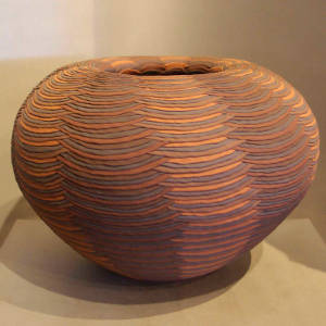 Corrugated surface on a polychrome jar