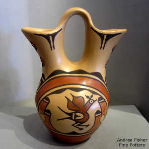 Bird, yucca, rainbow and geometric design on a polychrome wedding vase