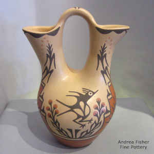 Bird, flower, raincloud and geometric design on a polychrome wedding vase