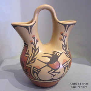 Roadrunner, rain cloud and geometric design on a polychrome wedding vase