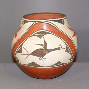 Roadrunner, rainbow and geometric design on a polychrome jar