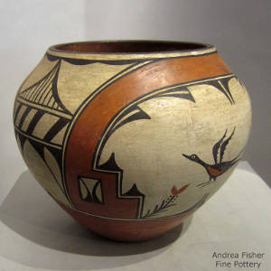 Bird, rainbow, cloud and geometric design on a polychrome olla
