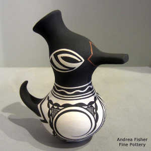Zuni geometric design on a polychrome duck pot