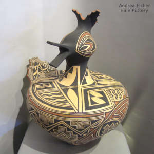 Geometric design on a polychrome duck pot