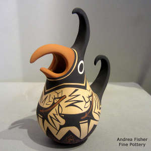 Deer, heart line and geometric design on a polychrome parrot pot