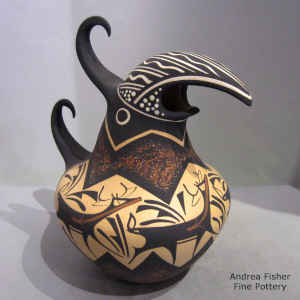 Deer, heart line and geometric design on a polychrome parrot pot