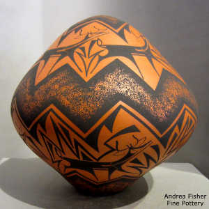 Cloud, lightning bolt, deer, heart line and geometric design on a black on red contemporary seed pot