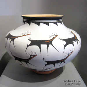 Deer, heart line and geometric design on a polychrome jar