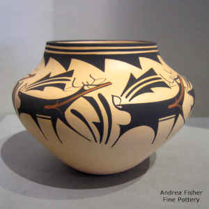 Deer, heart line and geometric design on a polychrome jar