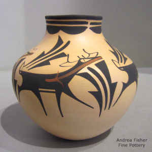 Deer, heart line and geometric design on a polychrome jar