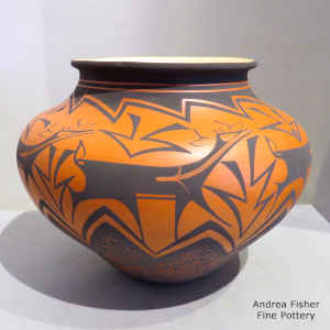 Deer, heart line and geometric design on a polychrome jar