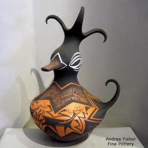 Deer, heart line and geometric design on a polychrome duckpot