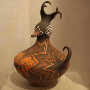 Deer, heart line design on a polychrome duck pot