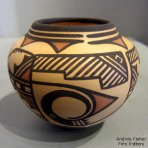 Kiva step, bird element, rain and geometric design on a polychrome jar