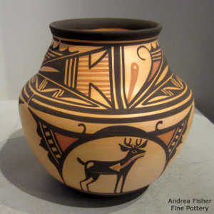 Deer in his house and geometric design on a polychrome jar