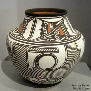 Rain, cloud, bird element and geometric design on a polychrome jar