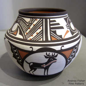 Deer-in-his-house and geometric design on a polychrome jar