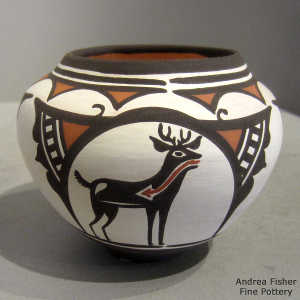 Deer-in-his-house and geometric design on a polychrome jar
