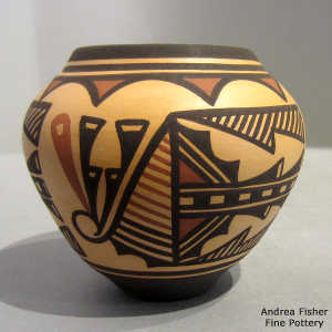Geometric design on a polychrome orange ware jar