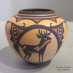 Deer-in-his-house and geometric design on a polychrome jar