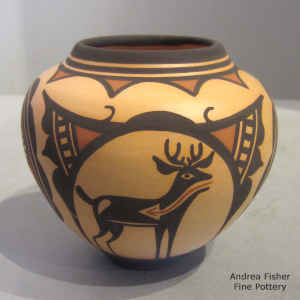 Deer, heart line and geometric design on a polychrome jar