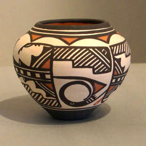 Bird element, rain, kiva step and geometric design on a polychrome jar