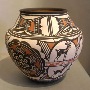 Deer heart line, bird, medallion and geometric design on a polychrome jar