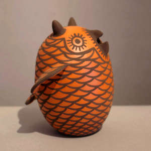 Owl in brown on orange